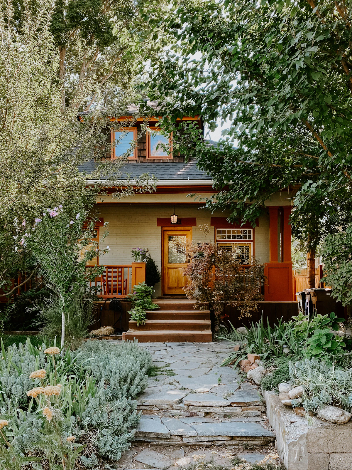 Bungalow with a covered porch and planted path